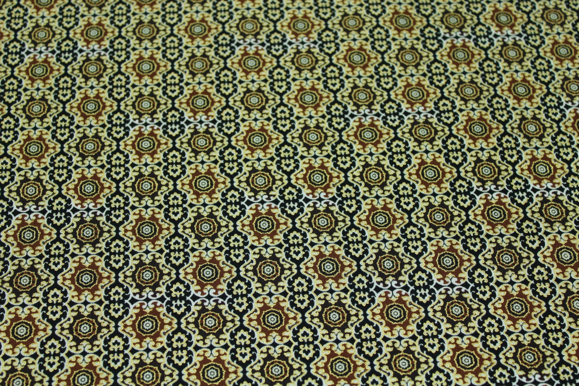 Black/brown/beige maroccan inspired goldedged cotton fabric intricate pattern