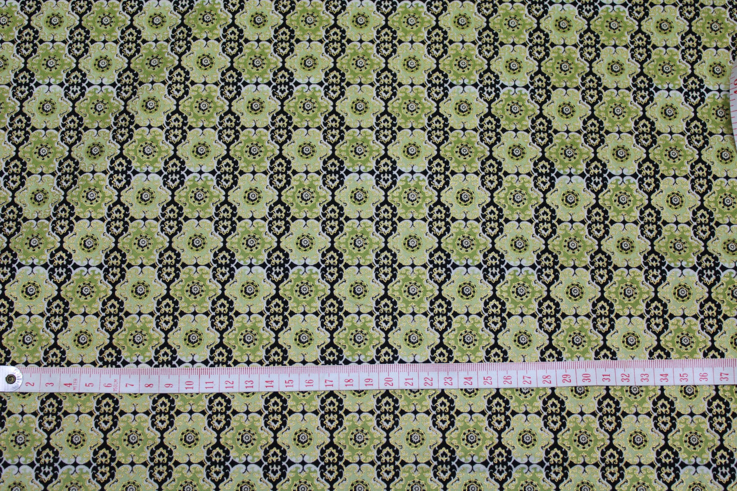 goldedged brown/green intricate moroccan pattern cotton print