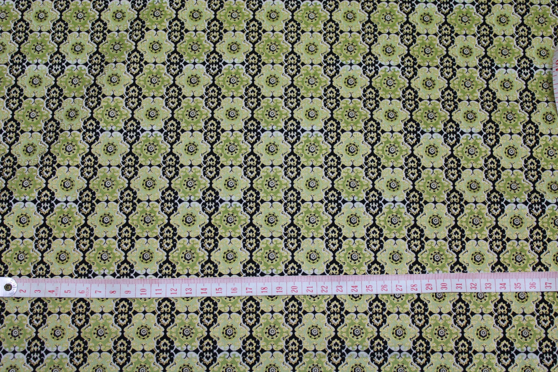 goldedged brown/green intricate moroccan pattern cotton print