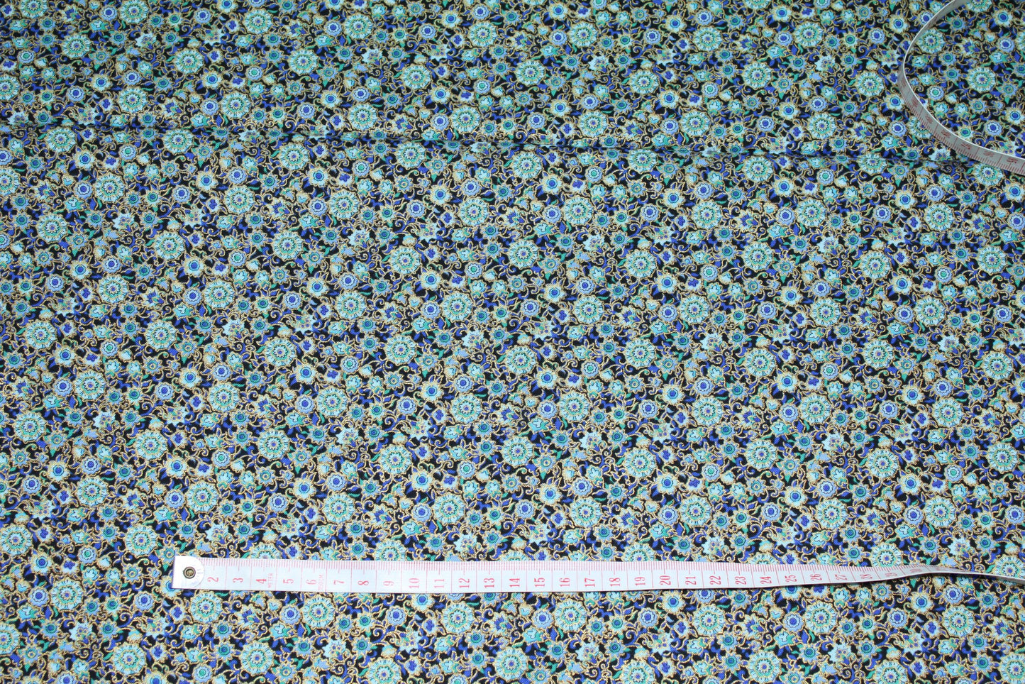 goldedged ditsy flower print in blues and turquoise