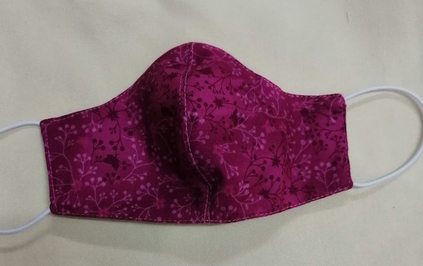 shaped facemask in cerise cotton fabric